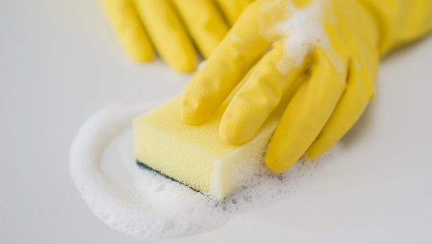 close-up-disinfecting-house-with-sponge
